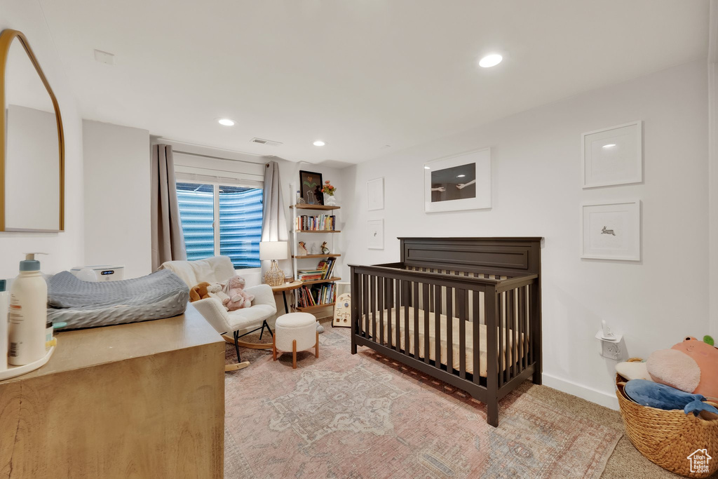 Bedroom with baseboards and recessed lighting