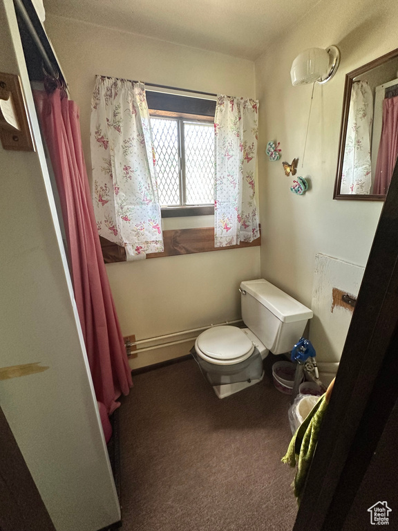 Full bathroom featuring toilet