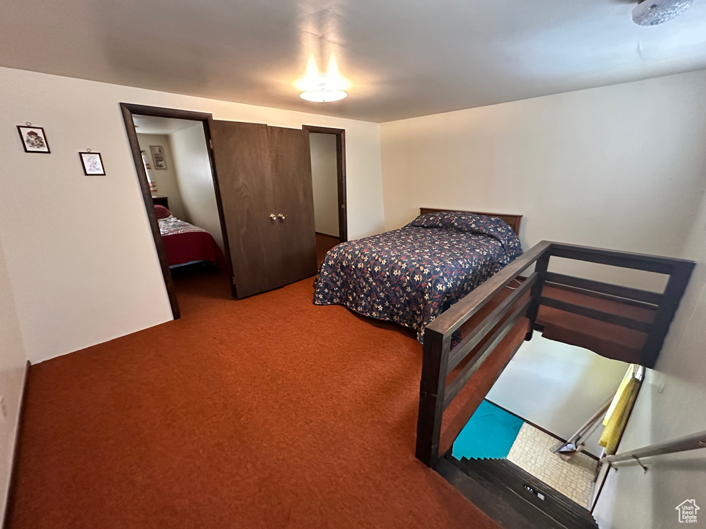 Bedroom with carpet flooring