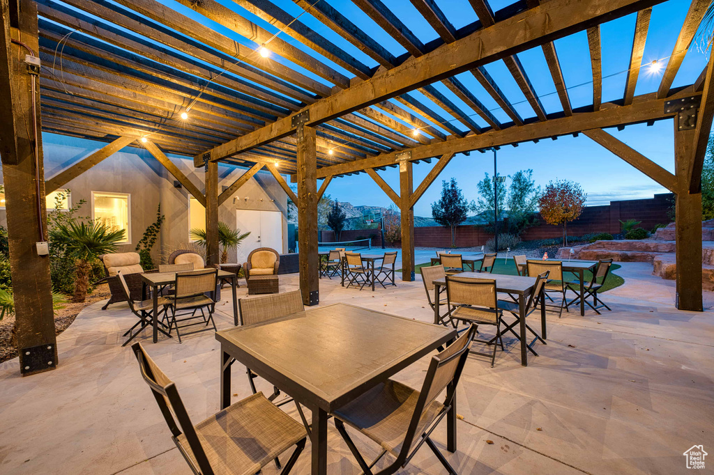 View of patio / terrace featuring outdoor dining area and a pergola