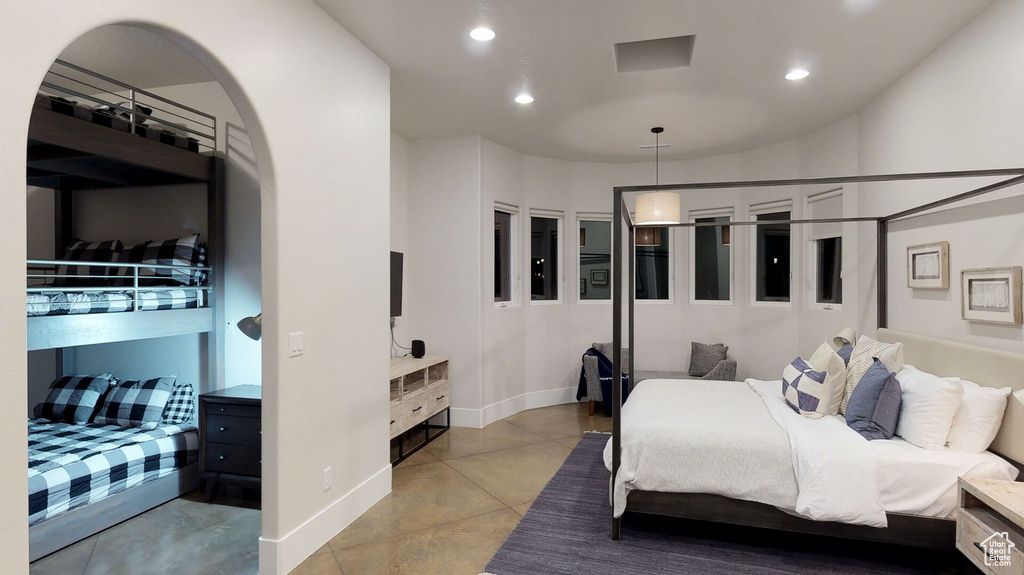 Bedroom with recessed lighting and tile patterned flooring