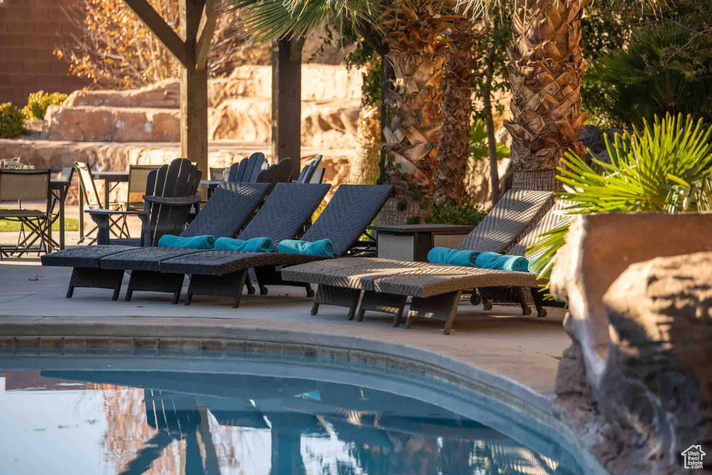 View of swimming pool with a patio area