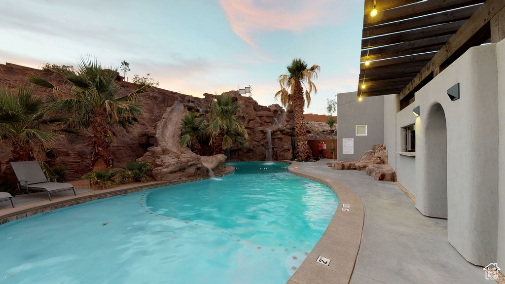 View of swimming pool featuring a patio area