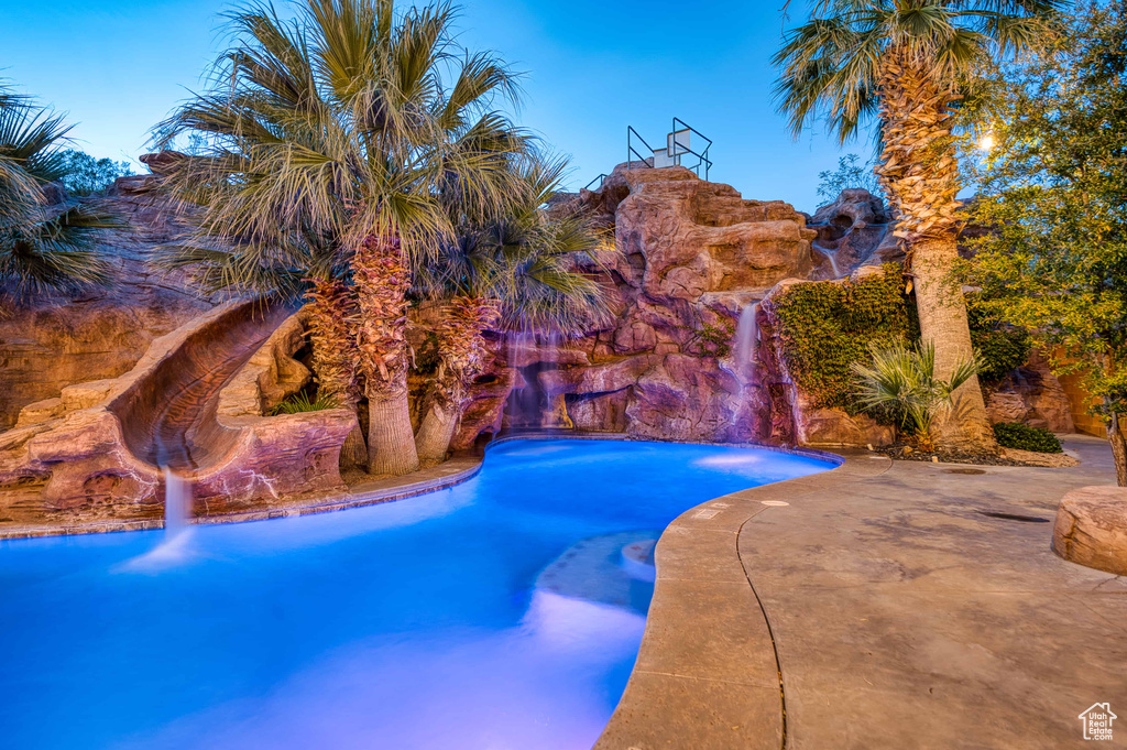 Outdoor pool with a patio area
