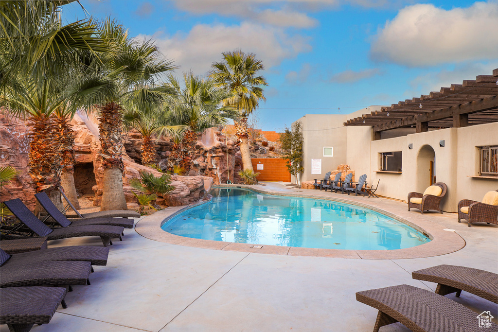 Outdoor pool with a patio area