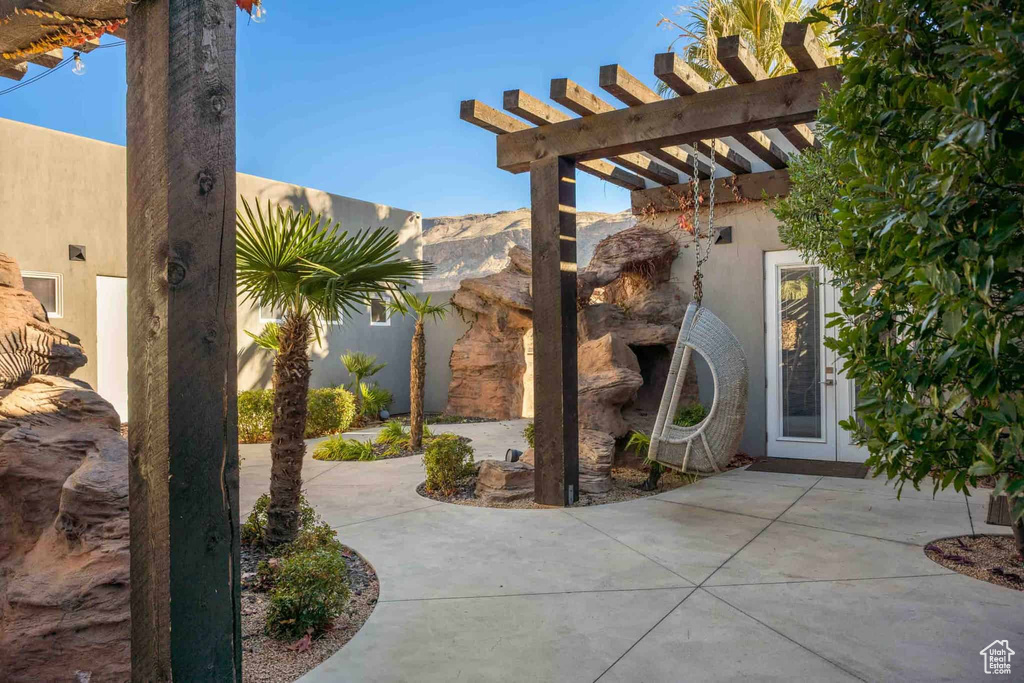 View of patio featuring a pergola