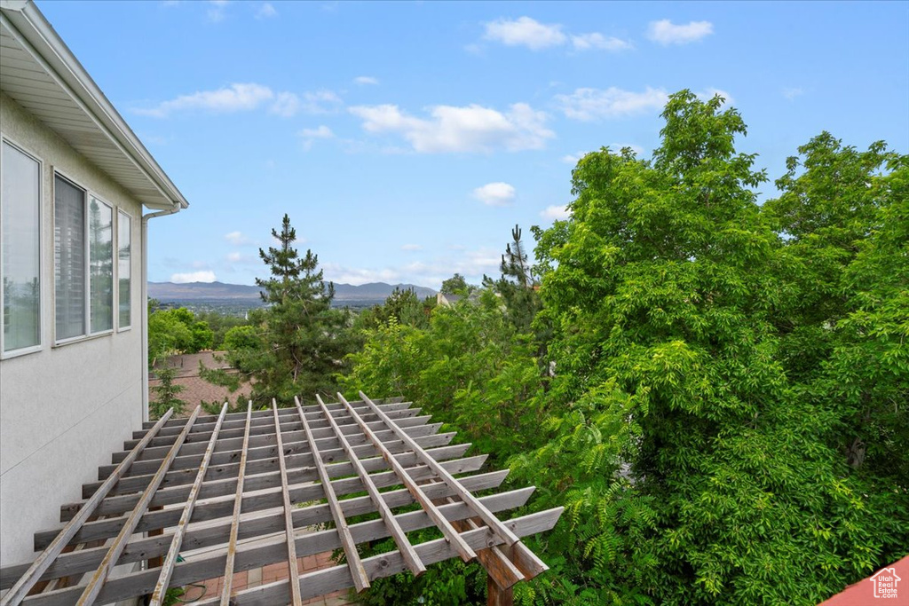 View of yard with stairway and a mountain view