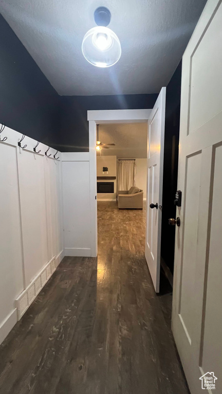 Hallway with wood finished floors