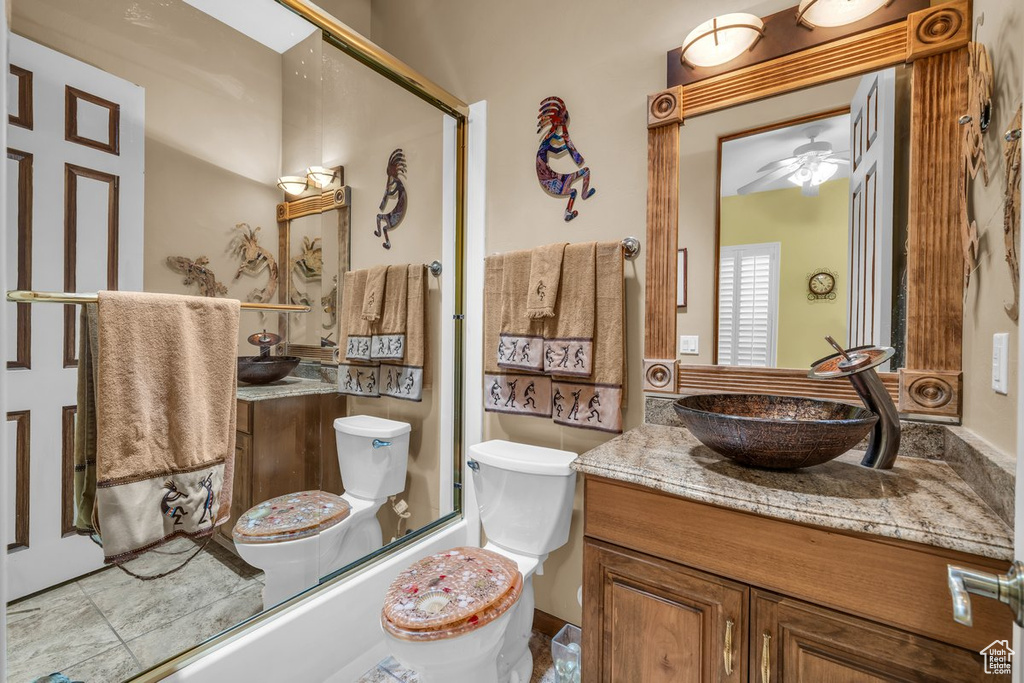 Full bathroom with vanity and bathtub / shower combination