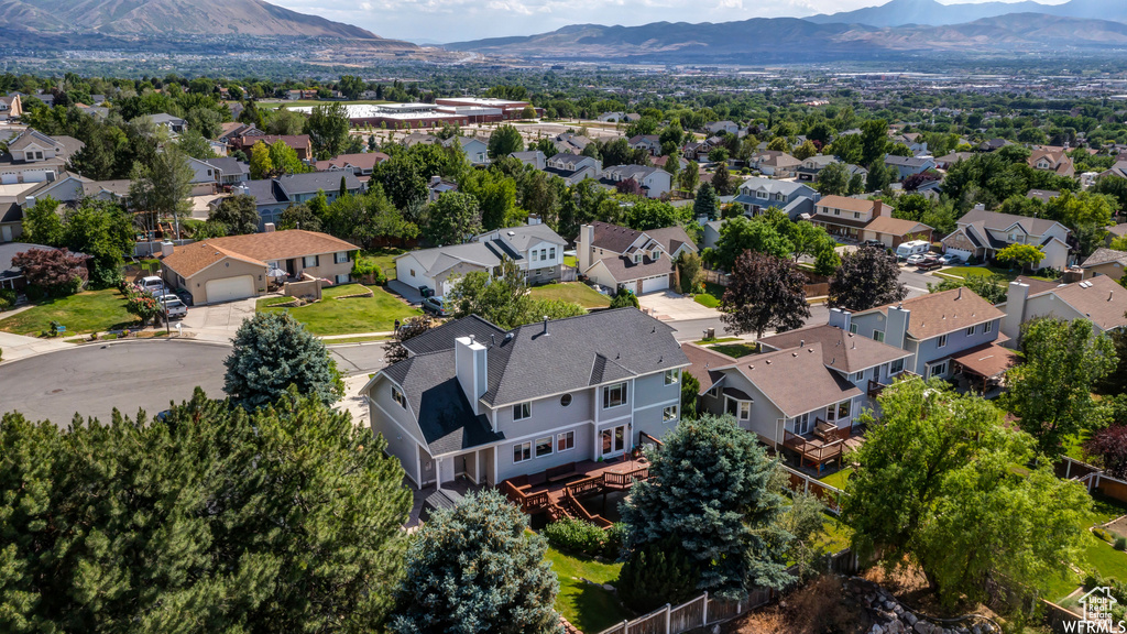 Aerial perspective of suburban area with mountains