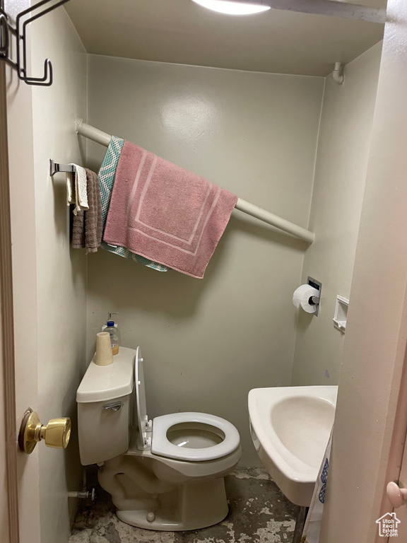 Bathroom with toilet and a sink