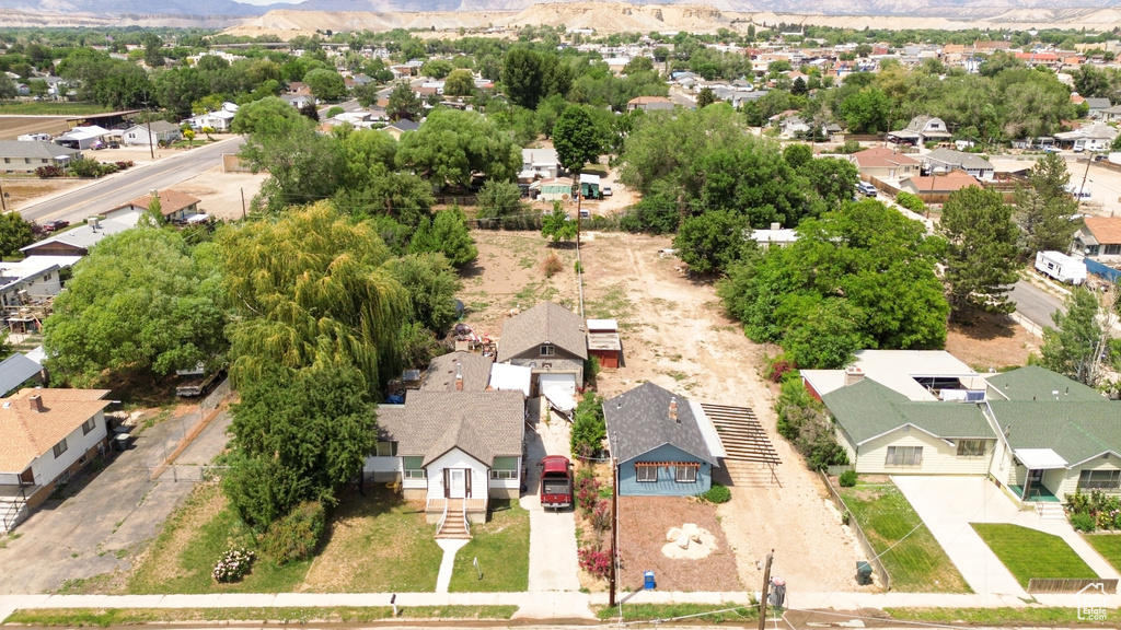 Aerial view of residential area with a mountainous background