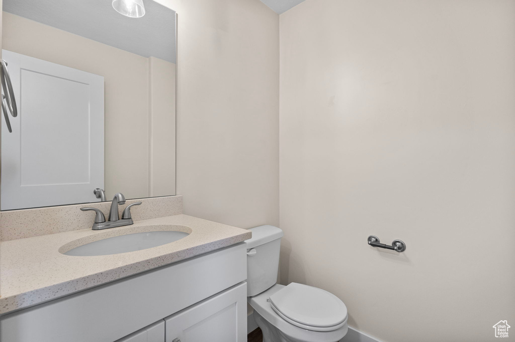 Bathroom with vanity and toilet