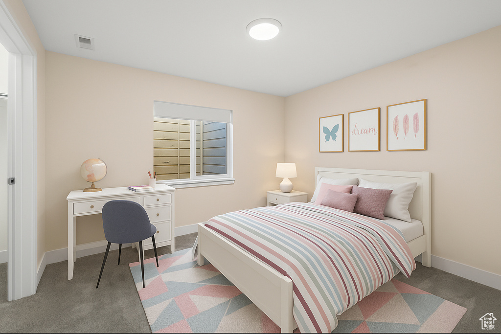Bedroom with carpet flooring