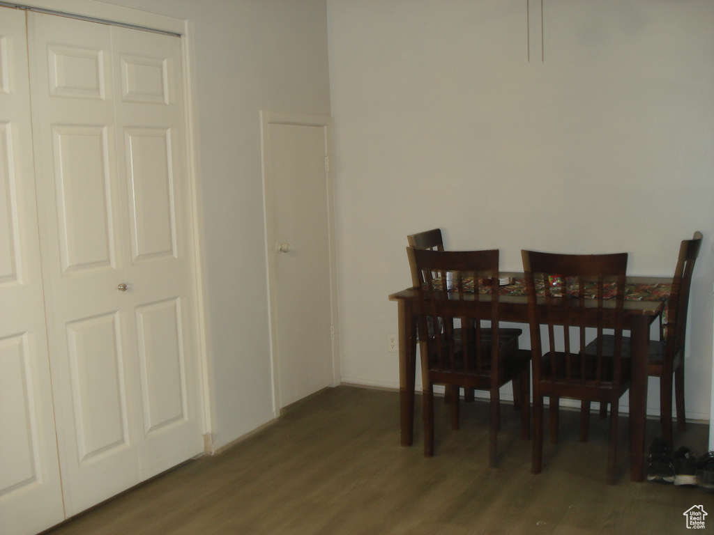 Dining area featuring wood finished floors