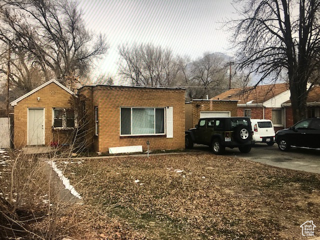 View of front of home with brick siding
