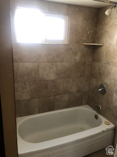 Bathroom with shower / bath combination