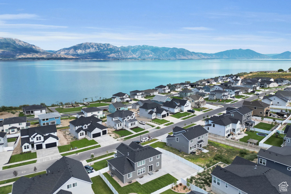 Aerial view of residential area with a water and mountain view