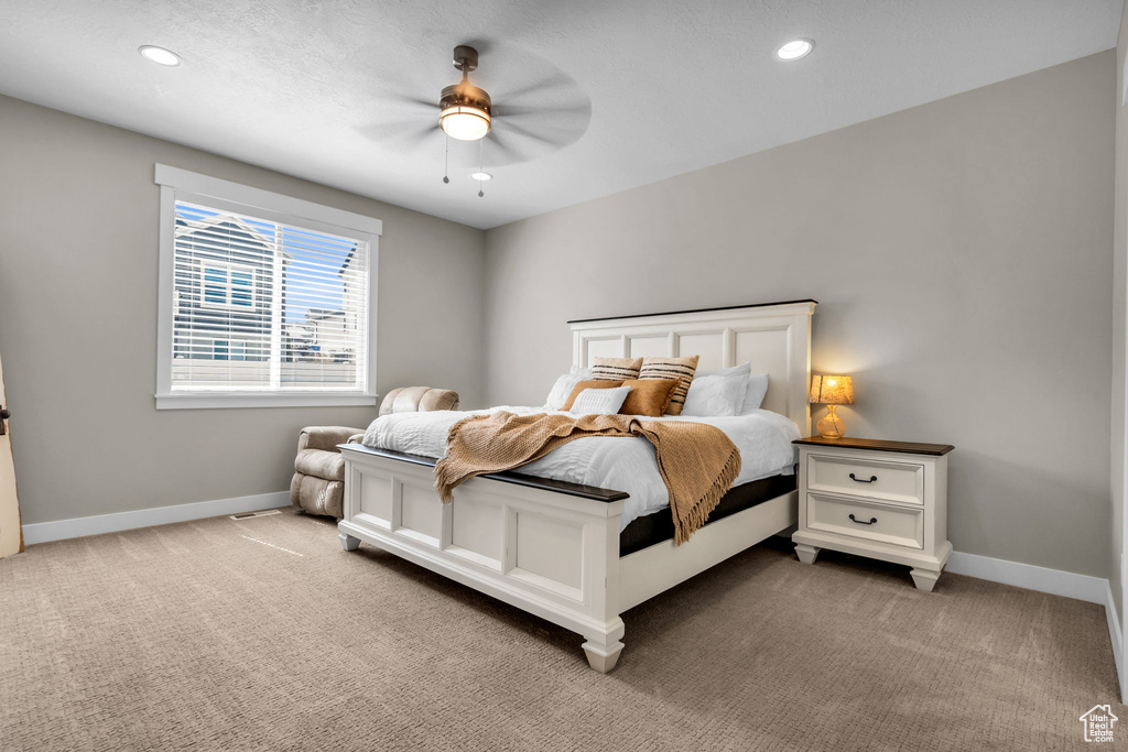 Bedroom featuring carpet flooring, recessed lighting, and ceiling fan