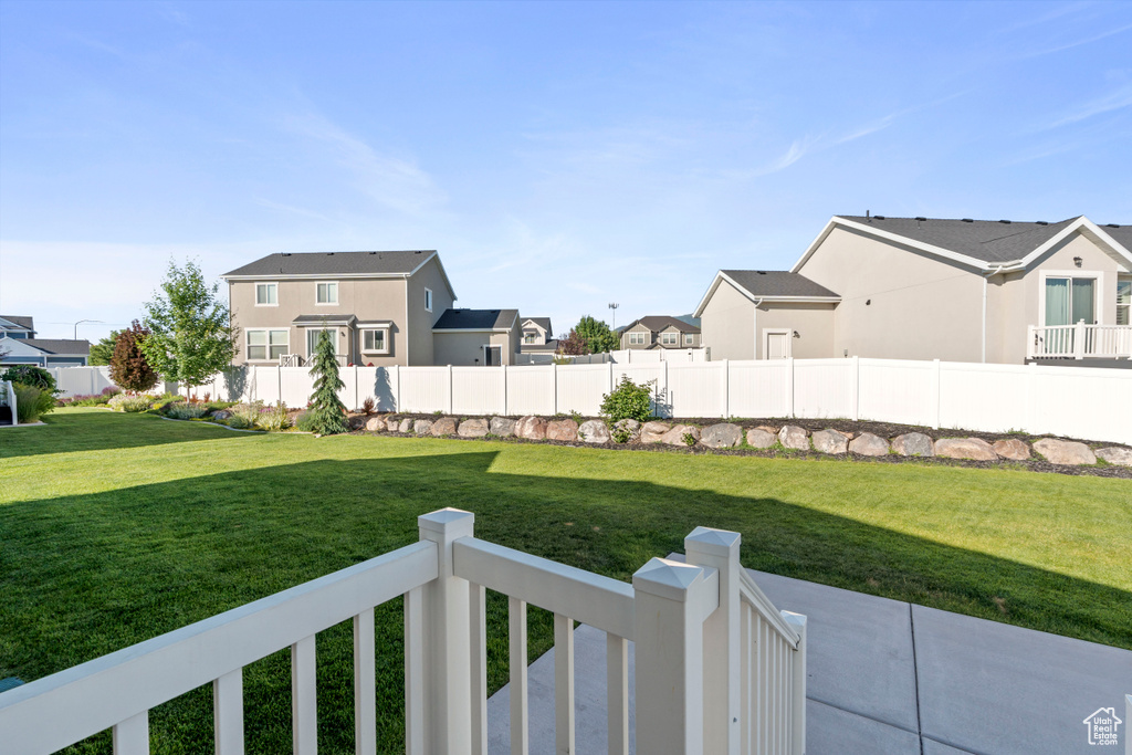 View of yard featuring a residential view