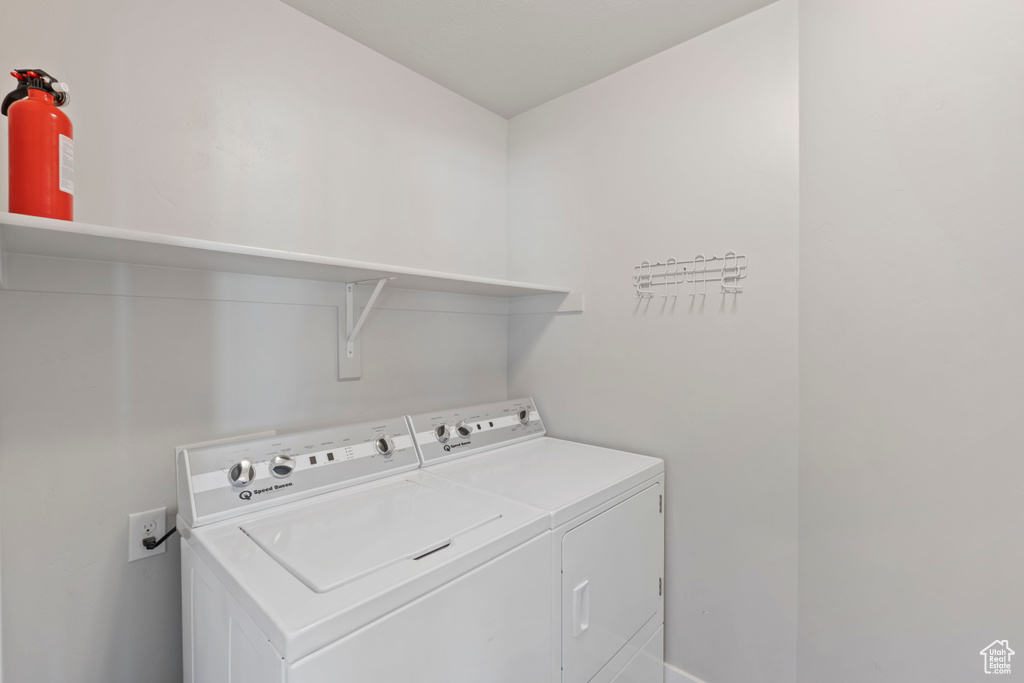 Laundry room featuring washing machine and dryer