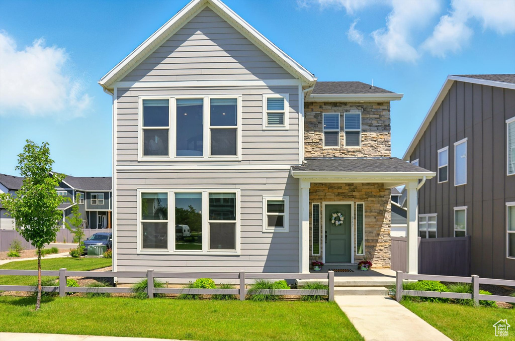 View of front of home featuring stone siding