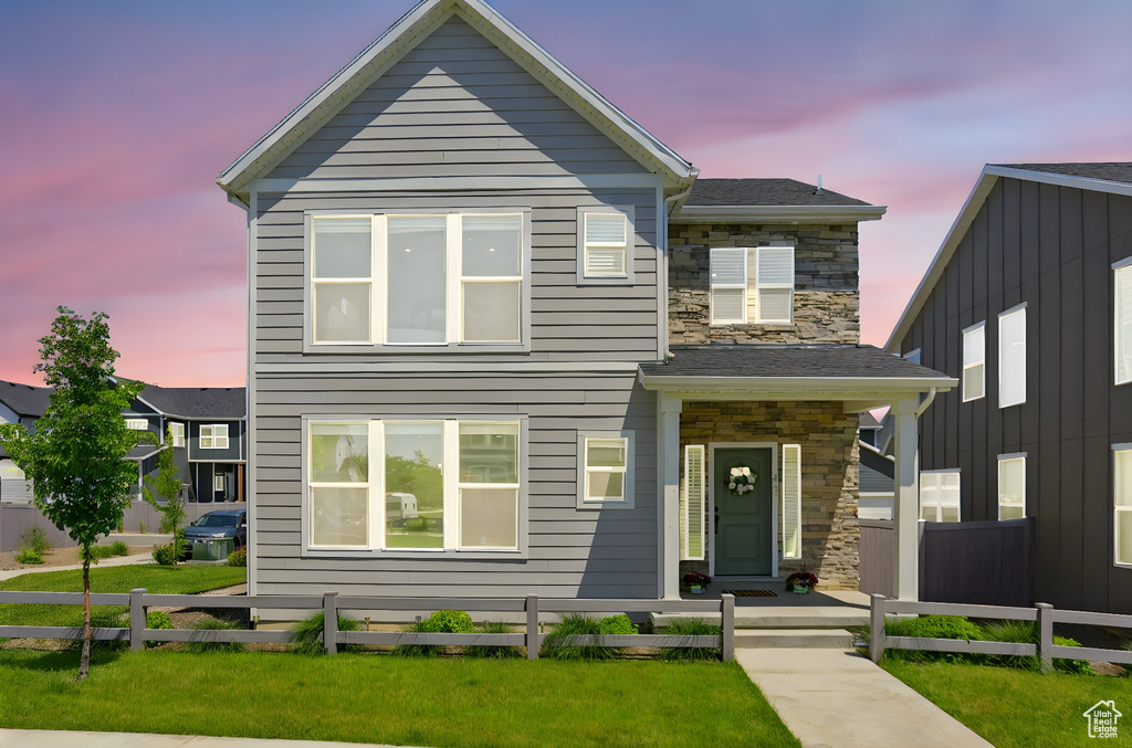 View of front of house featuring stone siding