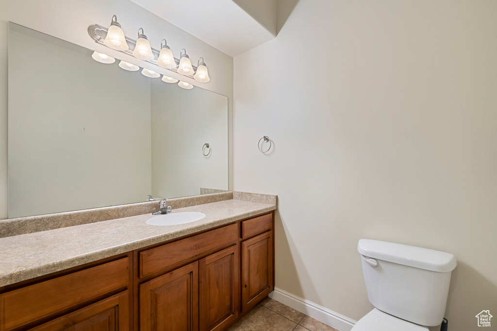 Bathroom with vanity and tile patterned floors