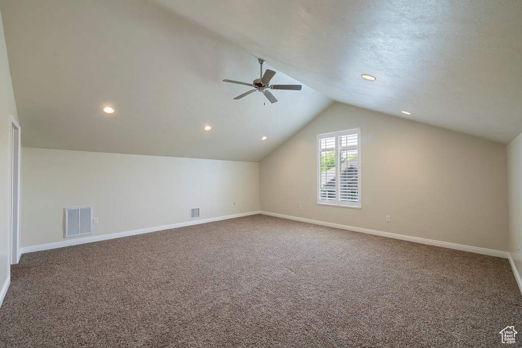 Bonus room featuring ceiling fan, lofted ceiling, carpet flooring, and recessed lighting