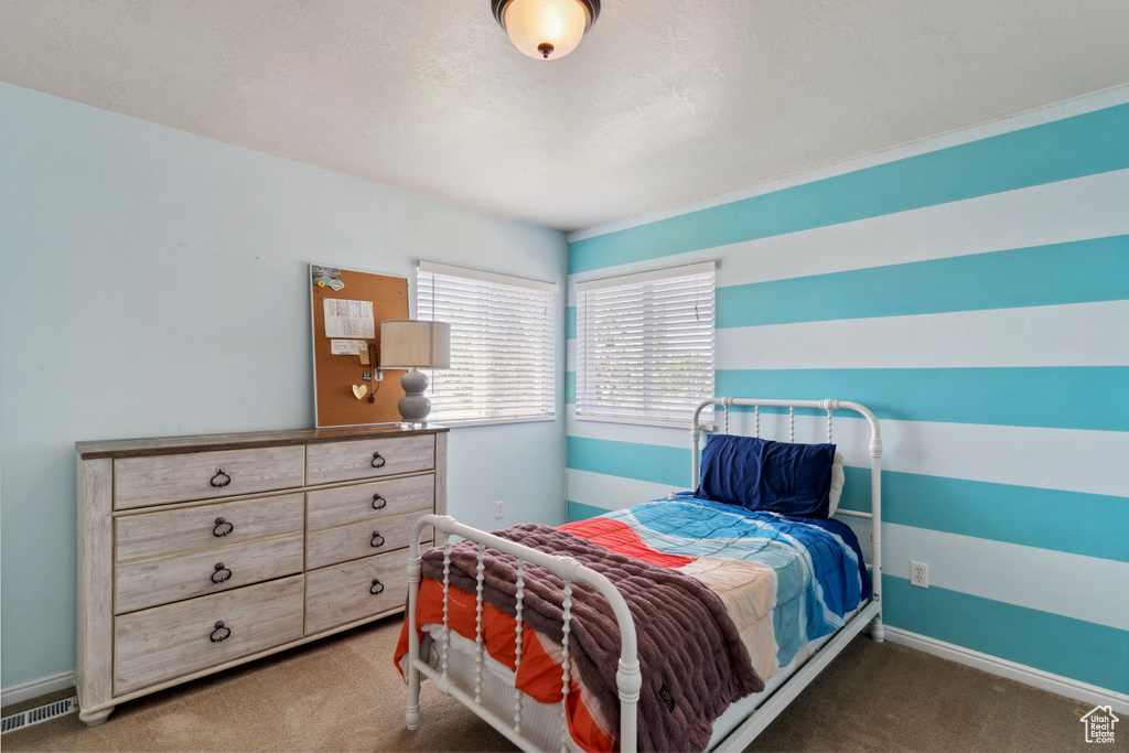 Bedroom featuring carpet floors