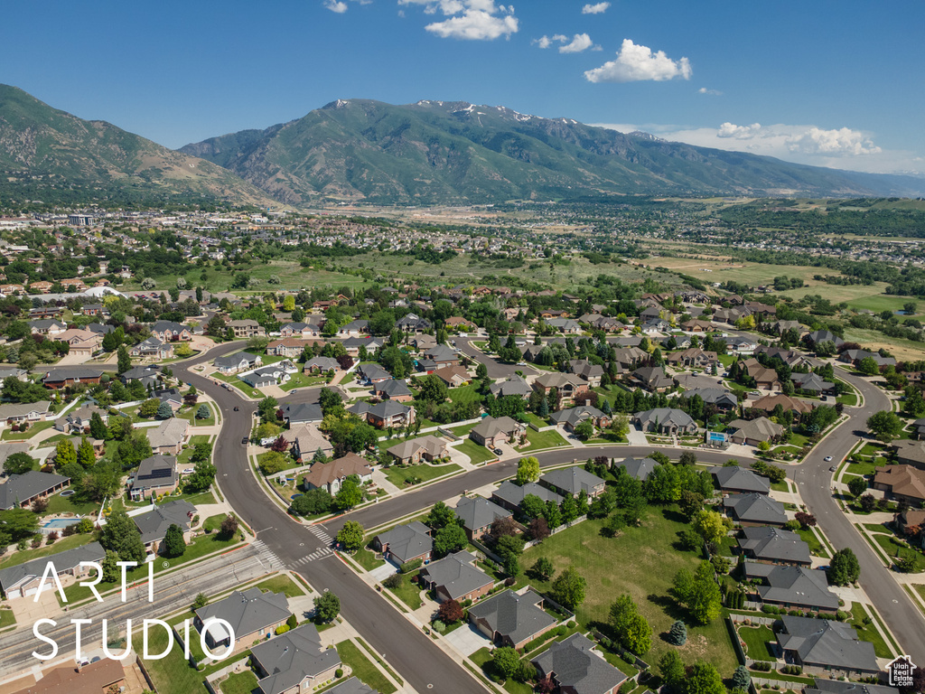 Aerial overview of property\\\\\\\'s location featuring mountains and nearby suburban area