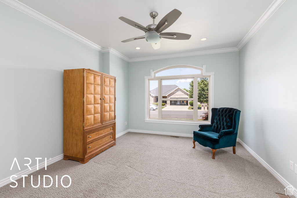Living area with carpet flooring, crown molding, ceiling fan, and recessed lighting