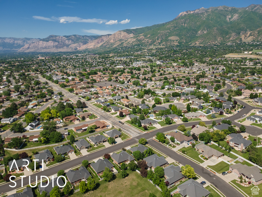 Aerial view of property\\\\\\\'s location with mountains and nearby suburban area