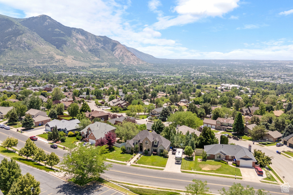 Aerial view of residential area featuring mountains