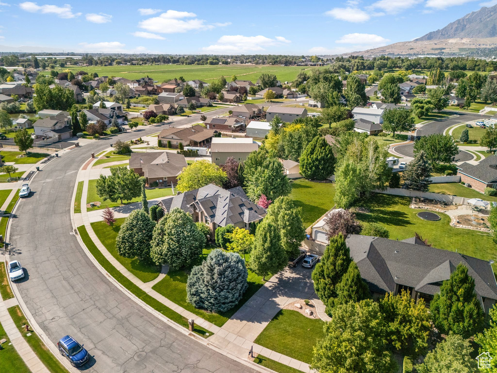 Aerial view of residential area featuring mountains