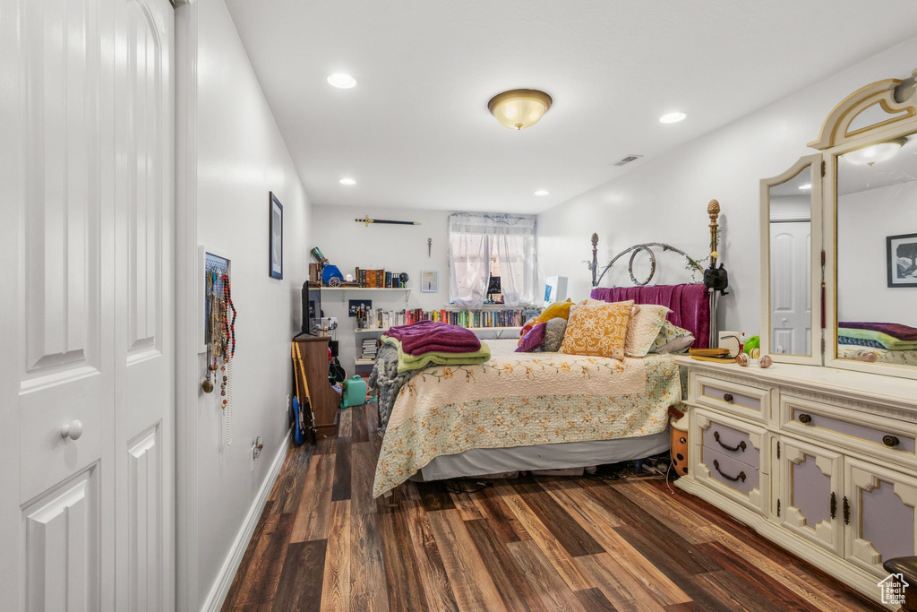 Bedroom featuring dark wood-type flooring and recessed lighting