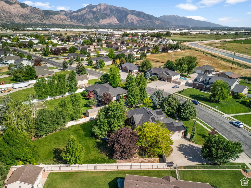 Aerial view of residential area with a mountainous background