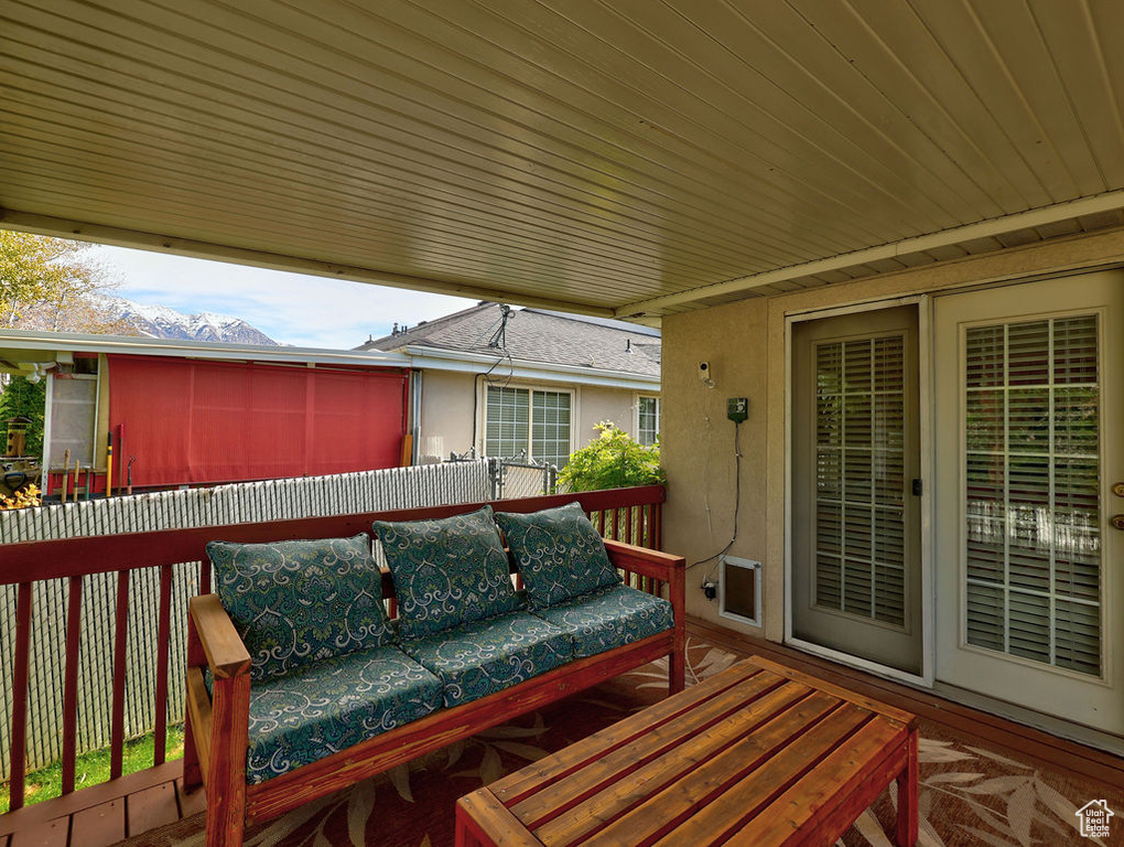 Wooden terrace with outdoor lounge area