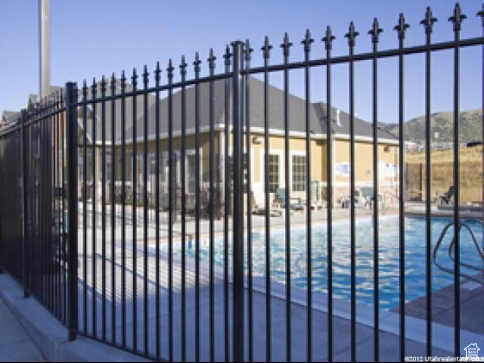Gate featuring a community pool