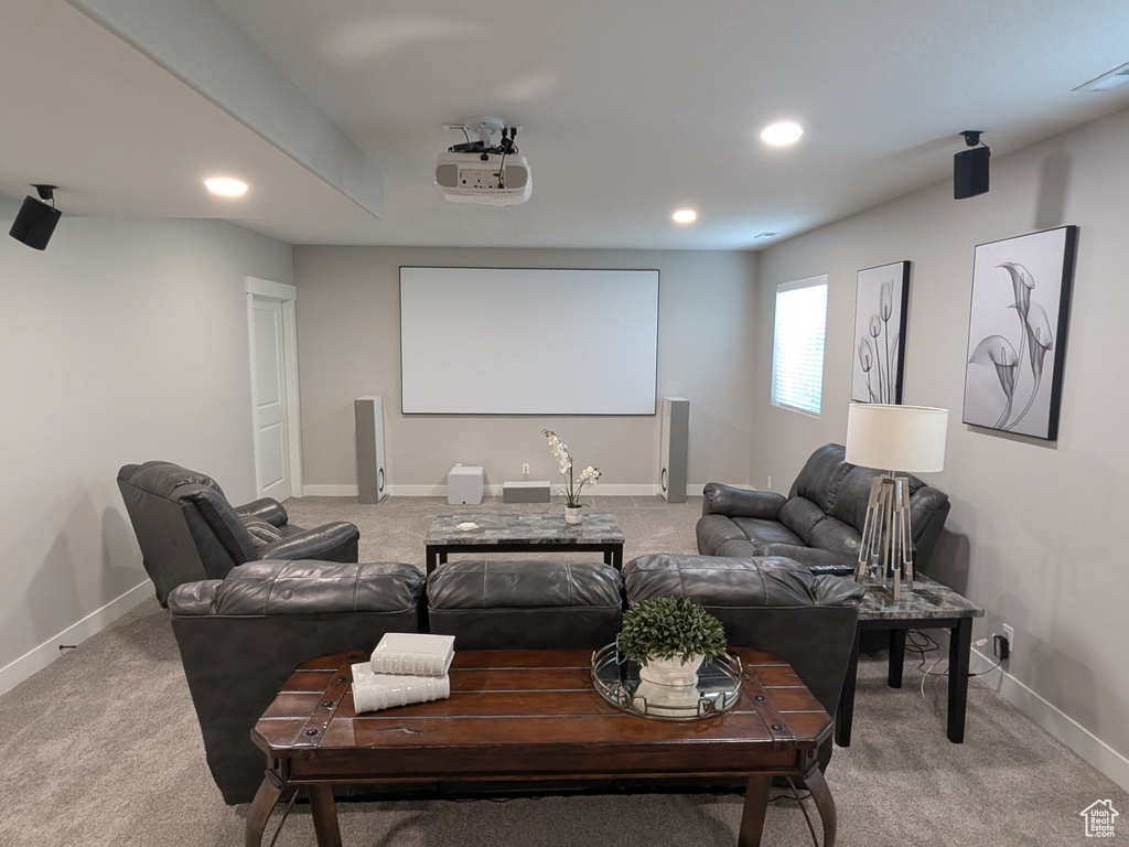 Cinema room featuring light carpet and recessed lighting