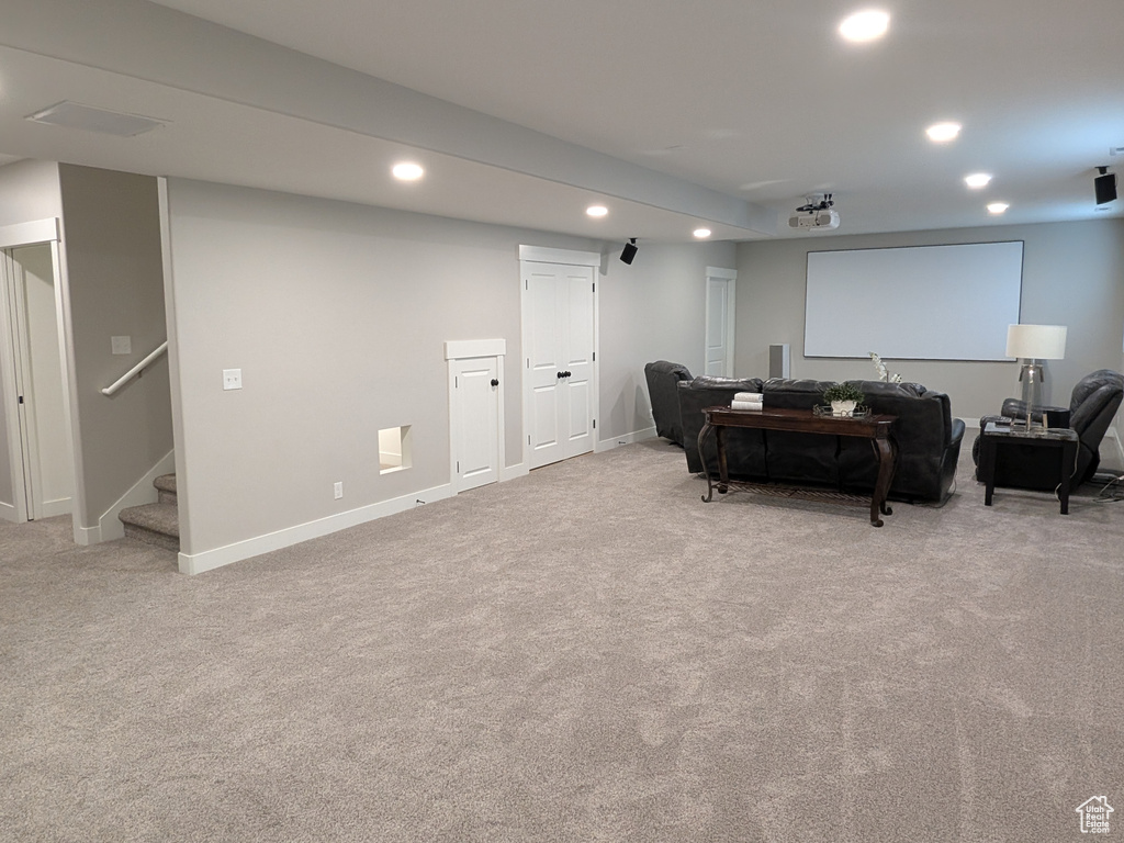 Cinema featuring recessed lighting and carpet floors