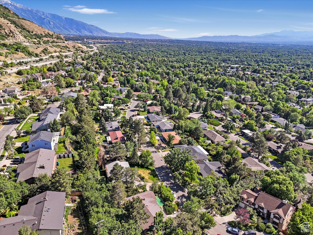Aerial view of residential area with mountains