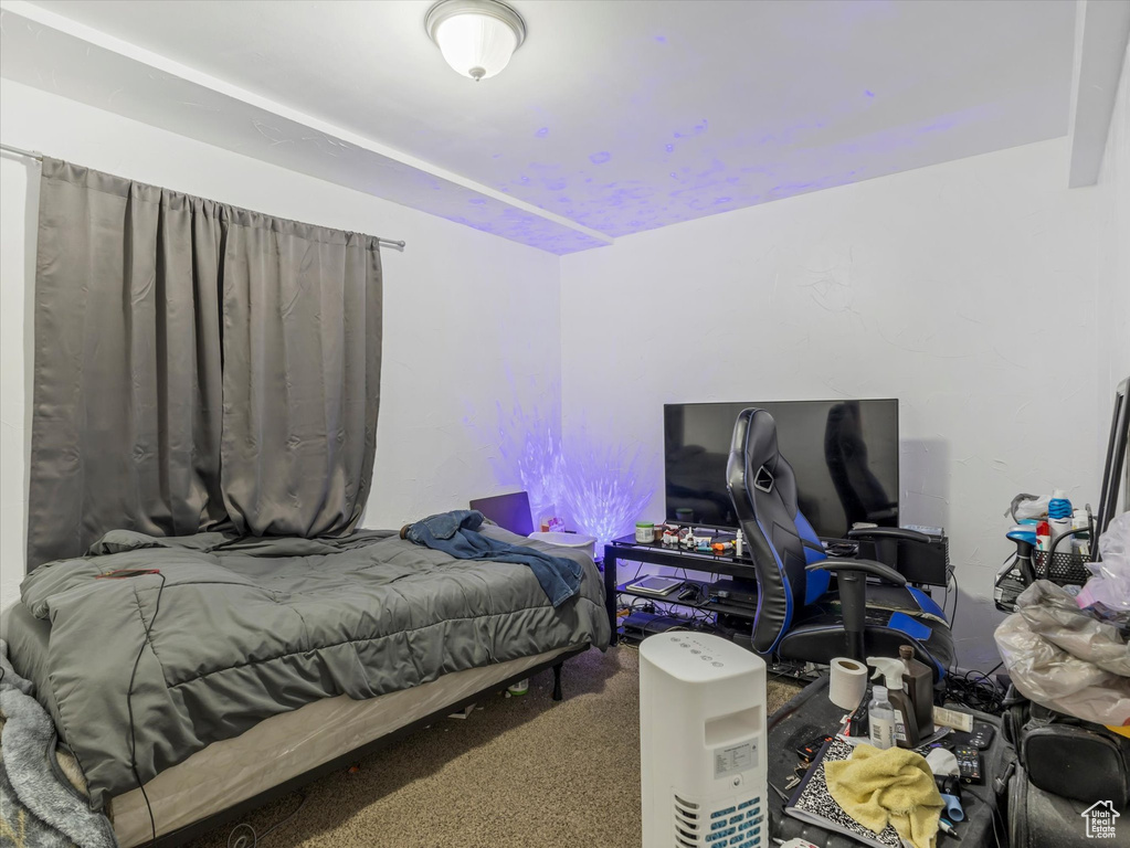 Bedroom featuring carpet flooring