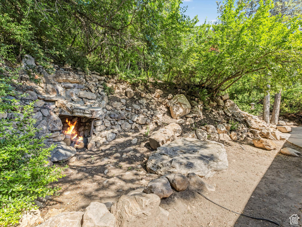 Exterior view of an outdoor stone fireplace
