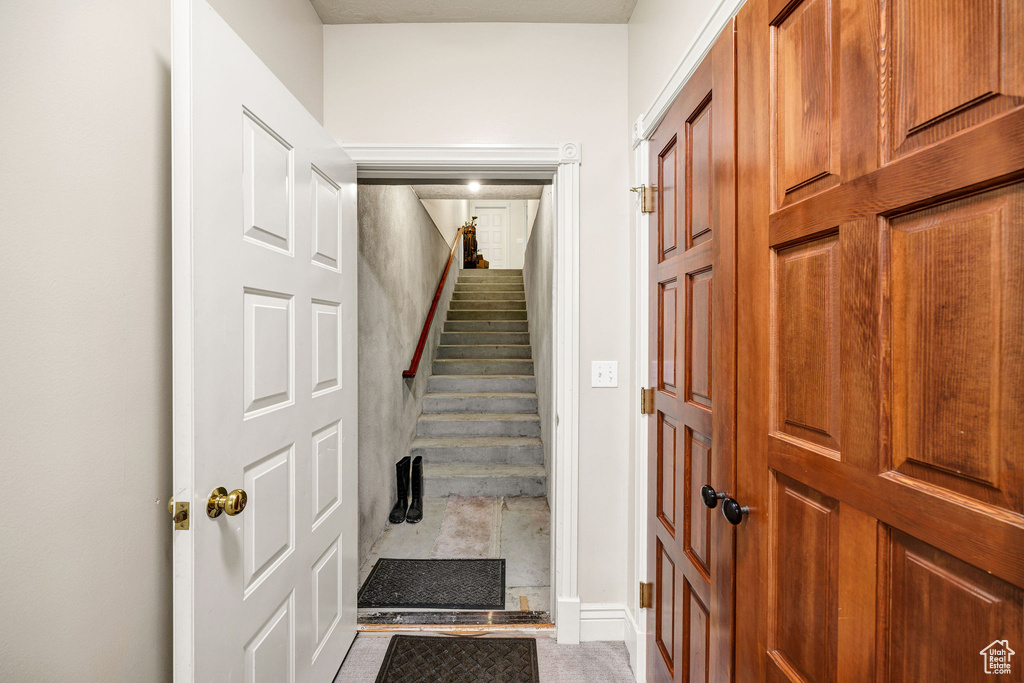 Stairway featuring baseboards