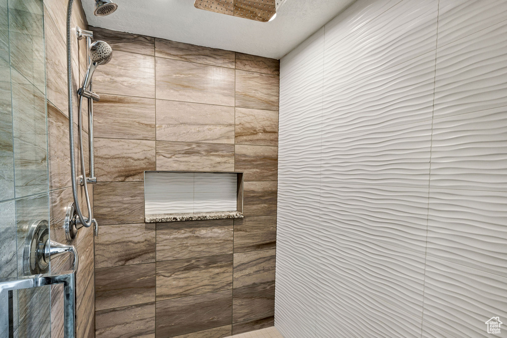 Bathroom with a tile shower
