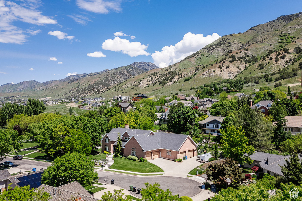 Mountain view featuring nearby suburban area