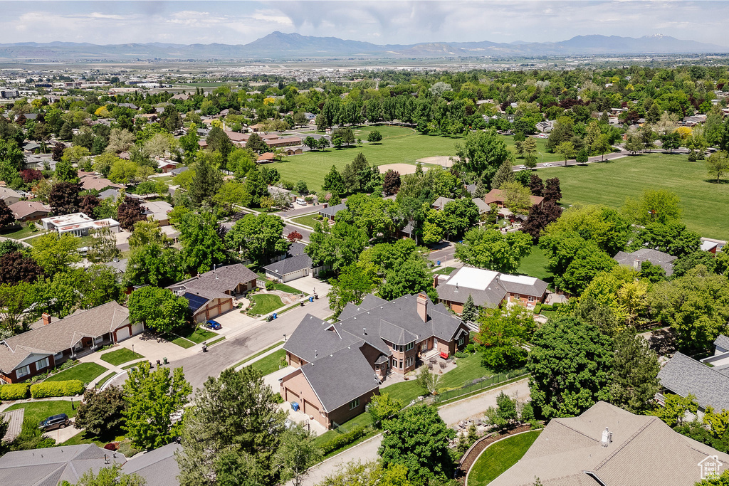 Aerial view of residential area with a mountain backdrop