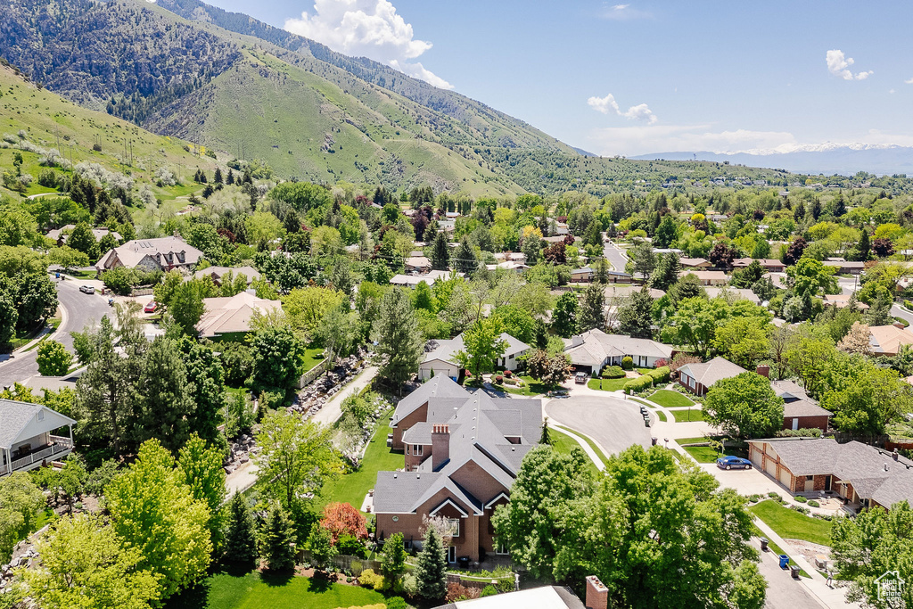 Aerial perspective of suburban area with mountains