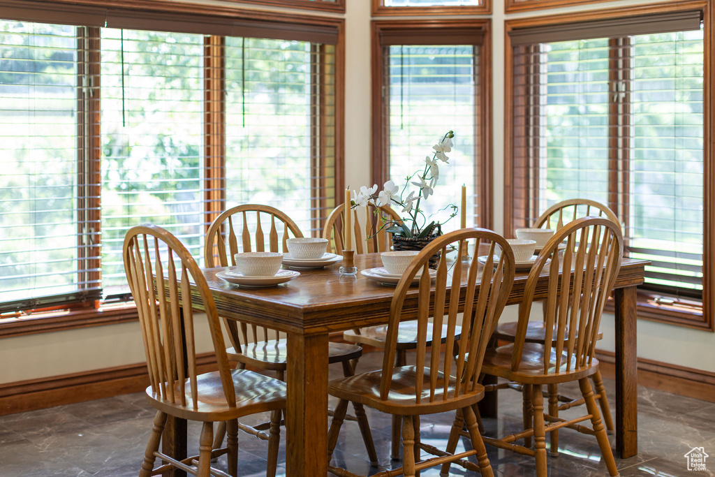 Dining space featuring baseboards